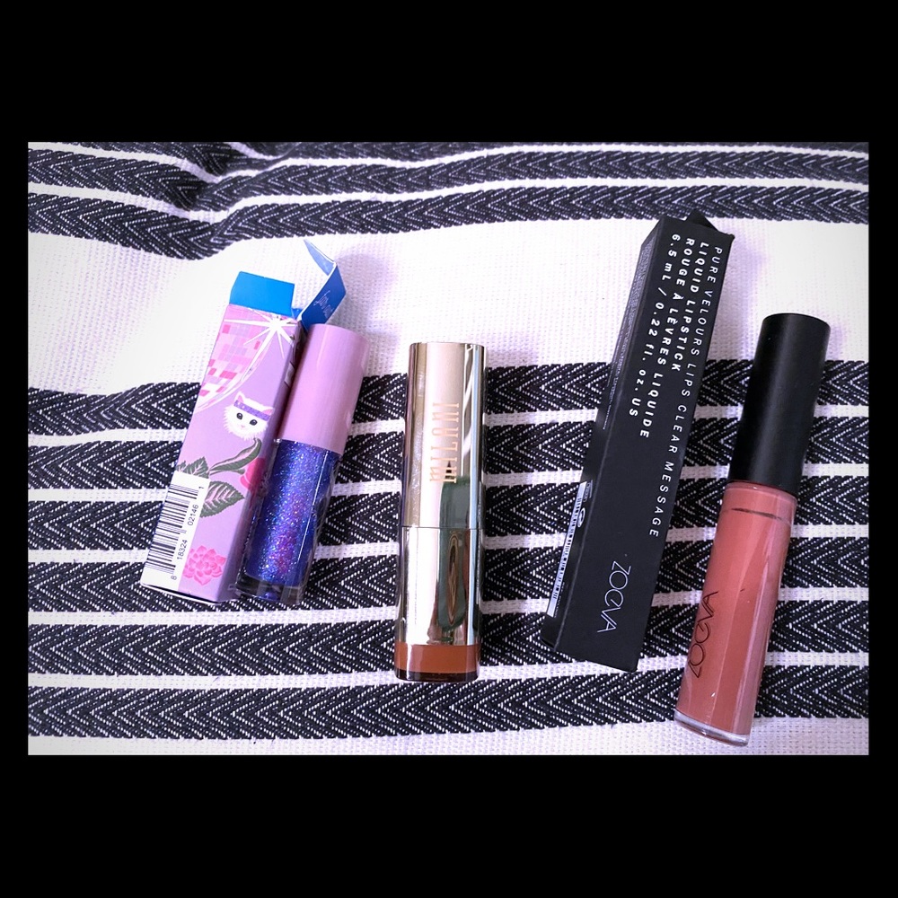 Three lipsticks/lipglosses